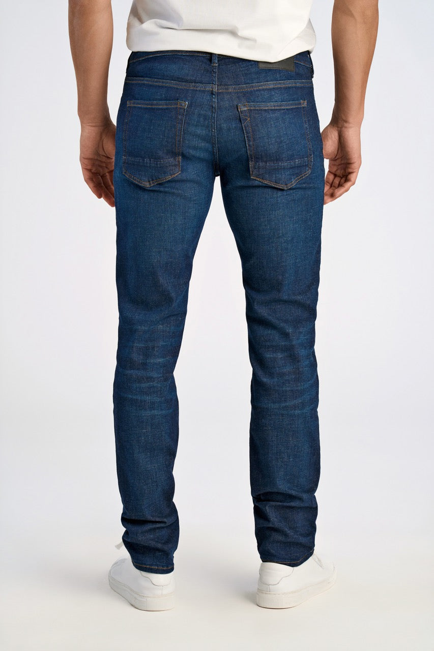 Dark wash tapered jeans