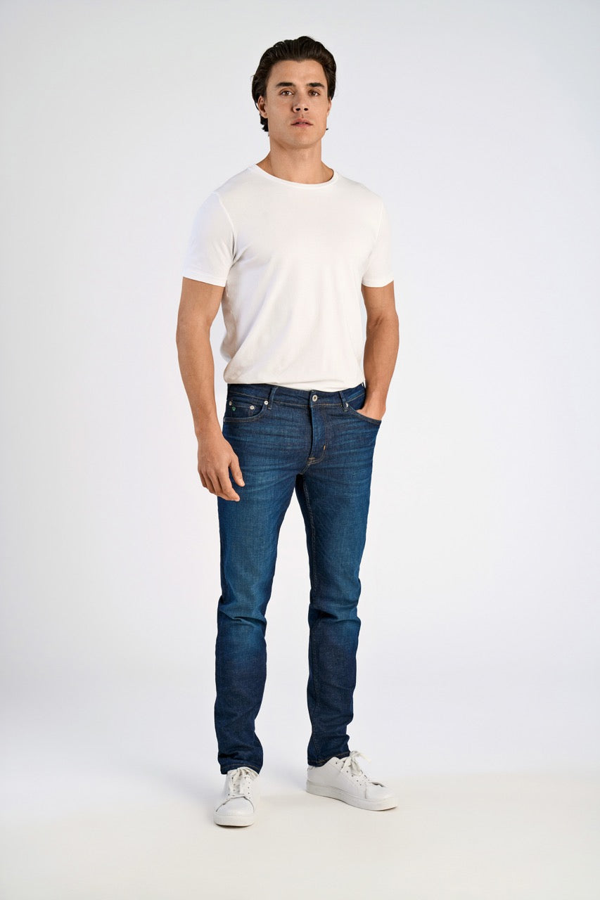 Dark wash tapered jeans