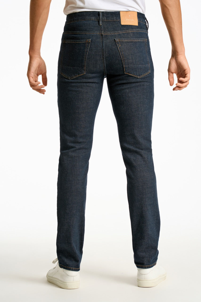 Washed indigo tapered jeans
