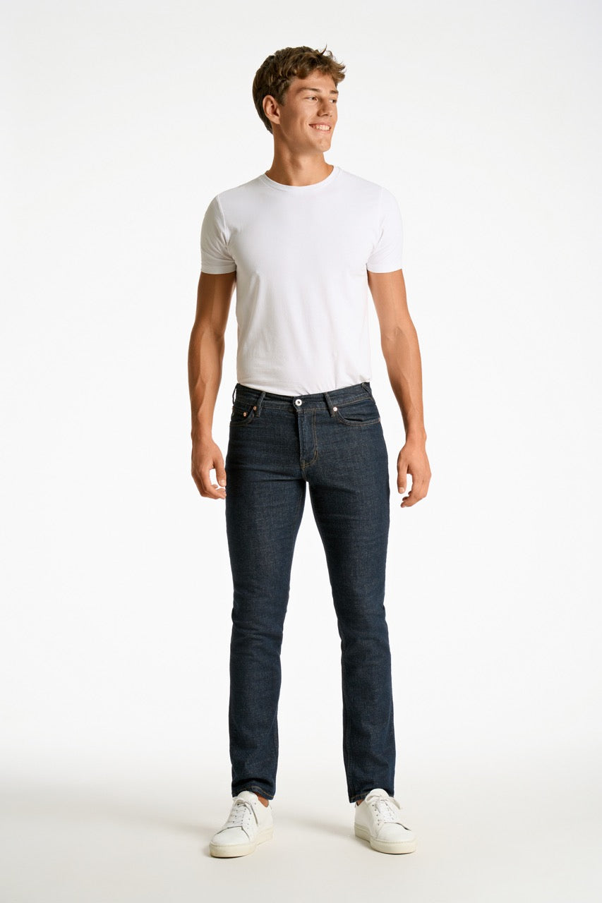 Washed indigo tapered jeans