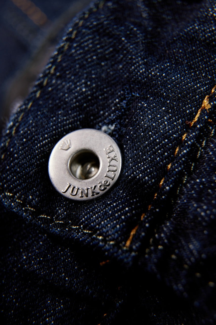 Washed indigo tapered jeans