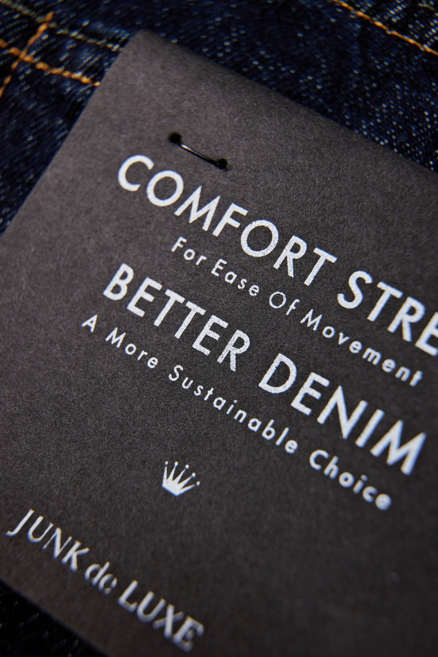 Washed indigo tapered jeans